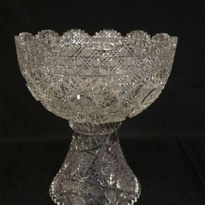 1140	BRILLIANT CUT GLASS PUNCH BOWL & STAND, APPROXIMATELY 12 IN X 13 1/2 IN HIGH, SOME CHIPPING ON TOP OF TEETH

