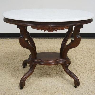 1189	WALNUT VICTORIAN OVAL MARBLE TOP TABLE
