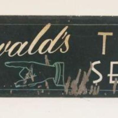 1016	ANTIQUE METAL SIGN GREENWALDS TRAVEL SERVICE, APPROXIMATELY 7 IN X 36 IN
