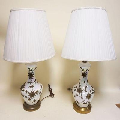 1274	PAIR OF IRIDESCENT WHITE TABLE LAMPS W/APPLIED VINES & FLOWERS, APPROXIMATELY31 IN HIGH, ONE SHADE HAS SOME STAINING
