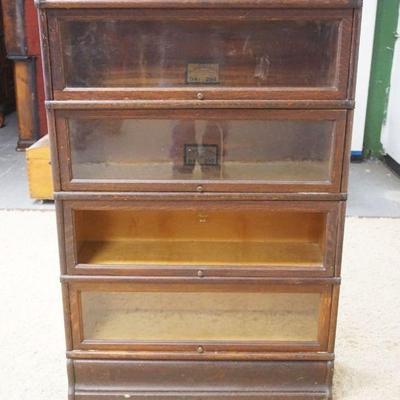 1214	OAK 4 SECTION GLOBE WERNICKE BARRISTER CASE, ONE GLASS MISSING, APPROXIMATELY 34 IN X 13 IN X 53 IN HIGH
