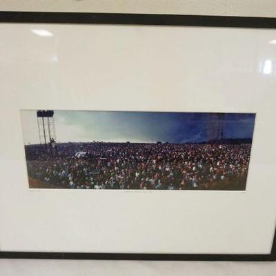 1104	PHOTO OF WOODSTOCK CONCERT SIGNED ELLIOTT LANDY ON MATT TITLED *BEFORE THE RAIN* NO 50, APPROXIMATELY 15 IN X 20 IN OVERALL
