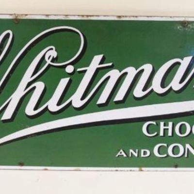 1017	ANTIQUE LARGE ENAMEL SIGN WHITMAN'S CHOCOLATES & CONFECTIONS, HEAVY GAUGE, APPROXIMATELY 39 1/2 IN X 13 1/ IN
