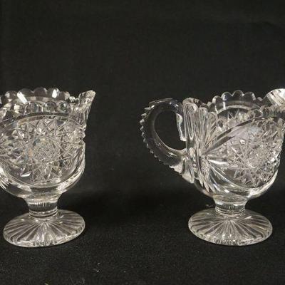 1139	BRILLIANT CUT GLASS FOOTED CREAMER & SUGAR, CREAMER HAS CHIP ON  LIP, APPROXIMATELY 4 1/2 IN HIGH
