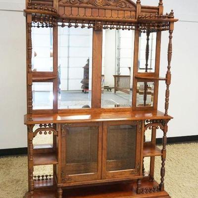 1208	VICTORIAN ETAGERE W/BEVELED GLASS DOORS & MIRRORS, APPLIED CARVED CREST & STICK & BALL TRIM, APPROXIMATELY 51 IN X 12 IN X 75 IN HIGH
