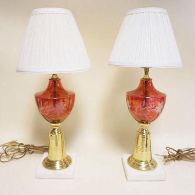 1039	PAIR TABLE LAMPS W/CRANBERRY WHEEL CUT FONTS ON BRASS & MARBLE BASE, APPROXIMATELY 19 IN HIGH
