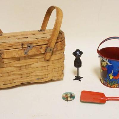 1074	LOT OF CHILD ITEMS INCLUDING TIN LITHO SAND PAIL, IRON MINIATURE DRESS FORM, WOVEN PICNIC BASKET APPROXIMATELY 9 IN X 6 IN X 7 IN HIGH

