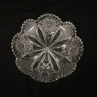 1142	BRILLIANT CUT GLASS BOWL, APPROXIMATELY 9 IN X 2 IN HIGH, SOME CHIPPING TO TOP TEETH
