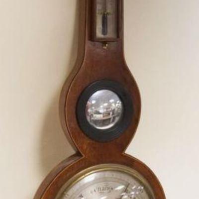 1084	ANTIQUE BAROMETER W/BULLSEYE MIRROR, INDICATING NEEDLE MISSING FROM TOP, DAMAGE TO GLASS IN TUBES BACK, APPROXIMATELY 10 IN X 39 IN...