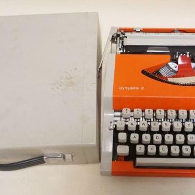 1307	OLYMPIETTE TYPEWRITER, APPROXIMATELY 12 IN X 13 IN X 4 IN
