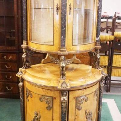 1183	EGYPTIAN REVIVAL 2 PART CORNER CABINET W/MARBLE & ORNATE METAL MOUNT, SOME MIRROR LOSS TO INTERIOR, APPROXIMATELY 27 IN X 80 IN HIGH
