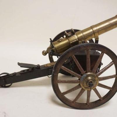 1150	SCALE MODEL OF A GATLING GUN W/WORKING REVOLVING TURRET, APPROXIMATELY 16 IN X 8 IN X 9 IN HIGH
