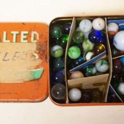 1089	COLLECTION OF ANTIQUE CHILDRENS MARBLES IN TIN

