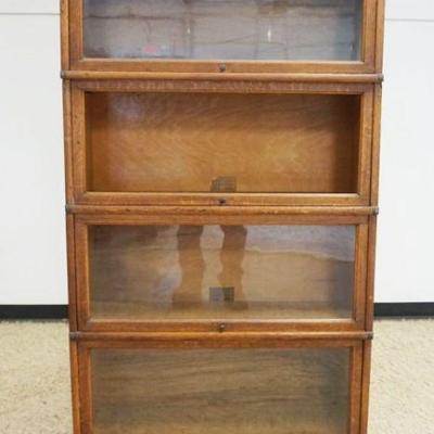 1213	OAK 4 SECTION GLOBE WERNICKE BOOKCASE, ONE GLASS MISSING, APPROXIMATELY 34 IN X 11 IN X 71 IN HIGH
