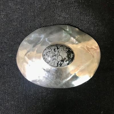 Large pin, signed by the artist. Not marked but appeared to be silver