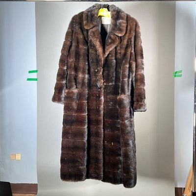 ELI GURLAND FUR COAT | Women's long fur coat with pockets, silk lined interior with Eli Gurland & Sons label. - l. 50 in (from...