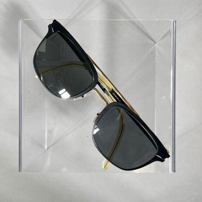 MYKITA SUNGLASSES | Mykita Sun Hunter prescription sunglasses, from the Mykita decades collection with black and gold-colored metal...