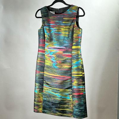 AKRIS PUNTO COLORFUL FABRIC DRESS | Colorful fabric dress for Akris Punto with blues, reds, yellows, blacks, and greens in a natural...
