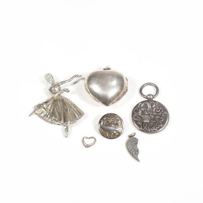 (6PC) STERLING PENDANTS & OTHER | Including a sterling silver heart-form locket pendant, a ballerina-form pin, a hollow art nouveau...