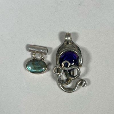 (2PC) MIXED PENDANTS | Including oval gemstone medallion and curved & bent fork medallion with glass bead. - h. 2 in (curved fork...