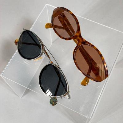 (2PC) PRESCRIPTION SUNGLASSES SET | Two pairs of prescription sunglasses: one by Alain Mikli Paris with a marbled brown frame, one by L.A...