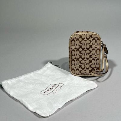 COACH PHONE WRISTLET | Small coach phone case/wallet with allover print. - l. 3.5 x w. 1 x h. 5 in
