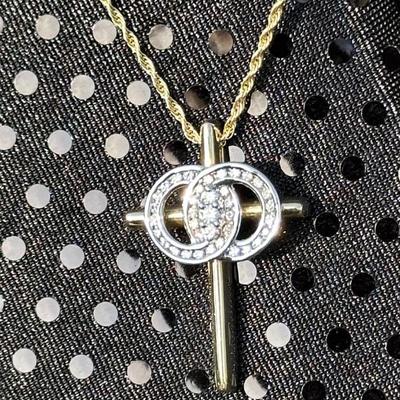 This beautiful necklaces symbolizes forever love in marriage. 14 k gold pendant on a fine 18†chain of 14 k gold
