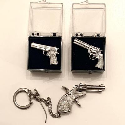 Colt pins and miniature cap pistol