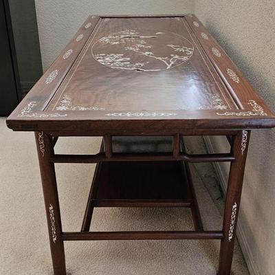 Coffee table with inlay