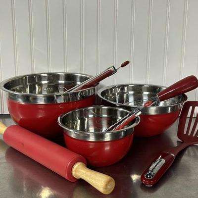3- Round Red & Stainless Nesting Mixing Bowls, Spatula, 2- Tongs, Wisk, Rolling Pin
At least 1 is Kitchen Aid