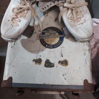 Roller skates in case with key