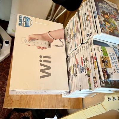 Wii console, game, guitar, and drums