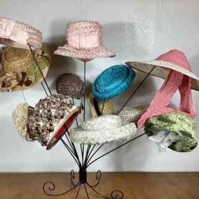 BIHY105 Cellophane Straw Hat Collection	This is a collection of vintage women's cellophane straw hats.Â The hats vary in size, style, and...