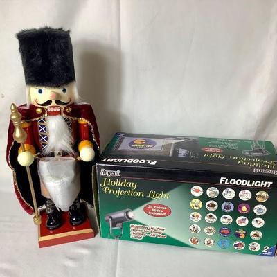 BIHY815 Nutcracker And Holiday Projector Light	Wooden nutcracker and outdoor projector light for multiple holidays. Both still in...