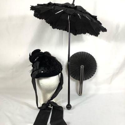 BIHY224 1800â€™s Mourning Attire	Parasol black umbrella, handle does fold for easier carry. Does have some rips in the umbrella. Antique...