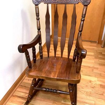 BIHY214 Vintage Press Back Rocking Chair	Believe to be made out of oak or walnut, Hand carved design on top. Looks to be in really good...