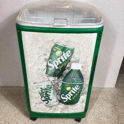 BIHY102 Sprite Ice Cooler Advertisement	This is a green and white ice cooler advertising Sprite lemon-lime soda pop. This beverage cooler...