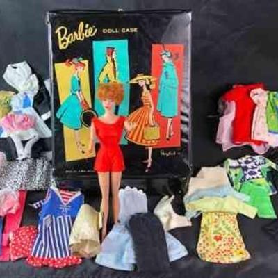 BIHY509 1958 Red Haired Bubble Cut Barbie With Carrying Case And Clothes	Original Barbie with lots of clothing with accessories including...