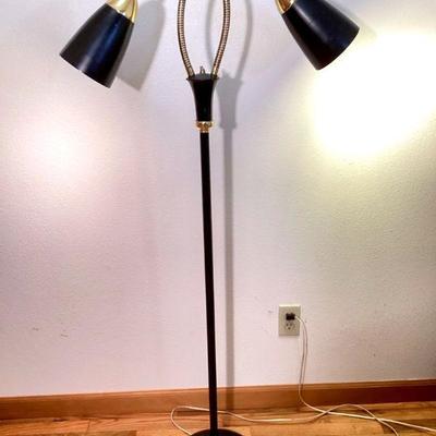 BIHY900 Gerald Thurston Style Gooseneck Floor Lamp	C. 1960 Double Gooseneck floor lamp in black wit brass detail. Â Measures...