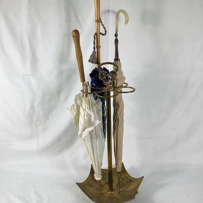 BIHY805 Brass Umbrella Stand With Parasols	Brass umbrella stand p, includes two parasols and one umbrella. Stand measures 13' in diameter...
