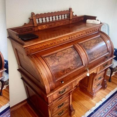 19th Century burled walnut desk with hidden doors