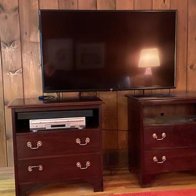 LG TV and mahogany cabinets