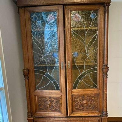 Antique Armoire with Stained Glass Doors & Carved Details