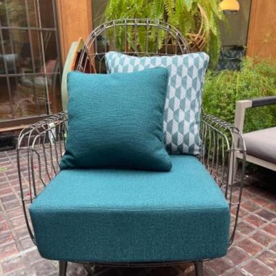 Four hands wire wing chair 