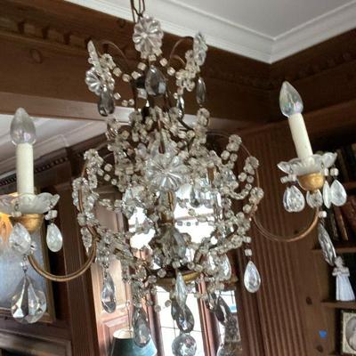 Petite Crystal Chandelier, beads are Murano Italian, ten rows of chains with smoked teardrops.  Three perimeter lights and one central...