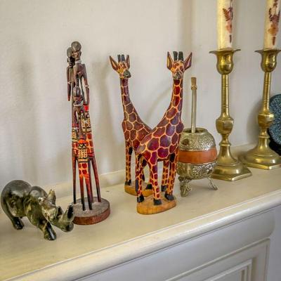 Giraffes carved in wood, Rhinoceros carved in stone or marble