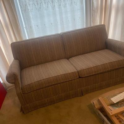 Loveseat hide a bed pristine condition