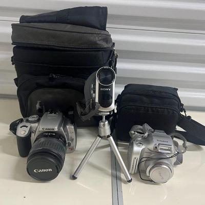 FTH036- Canon & Fujifilm Digital Cameras With Sony Handy Cam