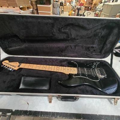 #1038 â€¢ Fender Electric Guitar
