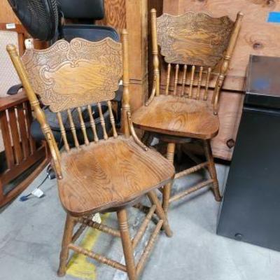 #5074 â€¢ (2) Wooden Swivel Chairs

